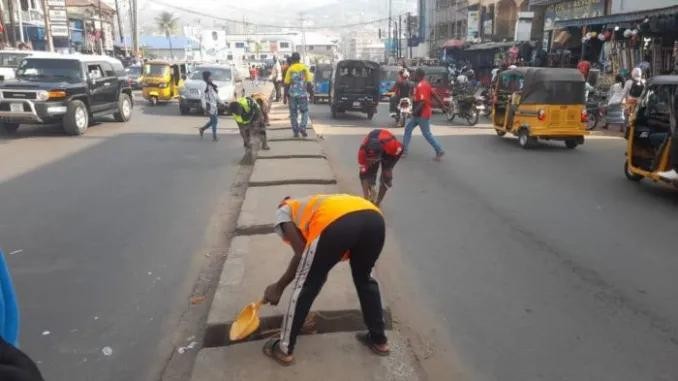 Freetown’s Unsung Heroes: Women Sweepers Battle Waste, One Street at a Time